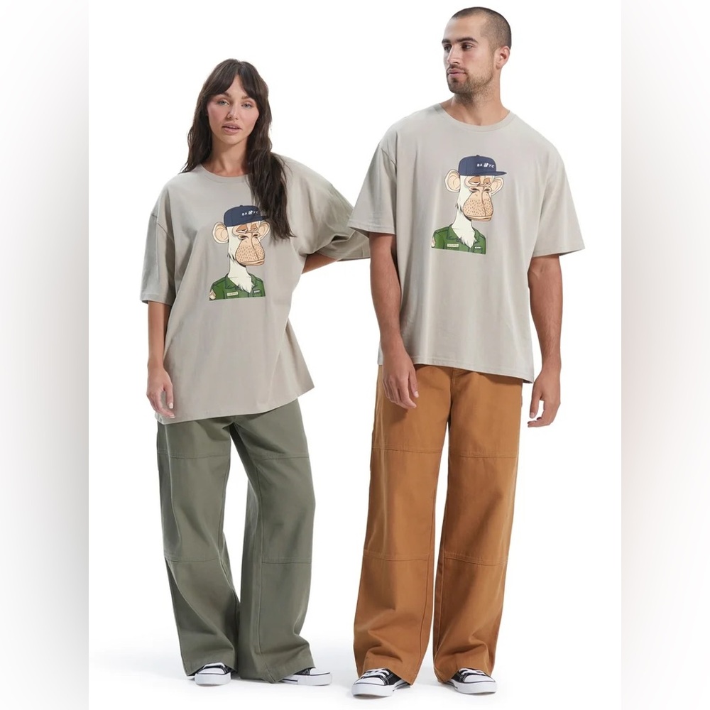 Unisex Oversized Graphic Tee. Color: Warm beige, Size: 3XL